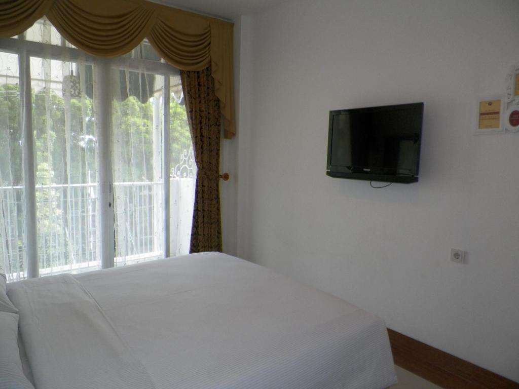The Victoria Guesthouse Bandung Værelse billede
